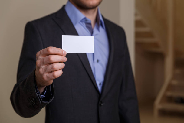 Businessman holding visit or business card. - Photo, Image