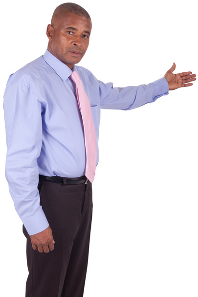 African American business man showing something on white - Foto, afbeelding
