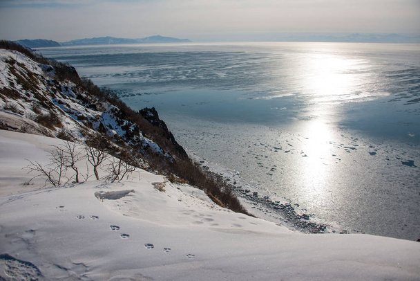 Сонце відбивається в Охотське море - Фото, зображення