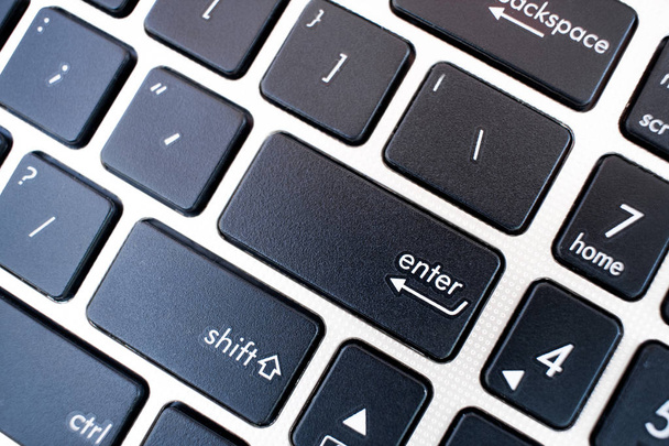 Flat black modern Keyboard of a laptop. Enter, shift - Fotografie, Obrázek