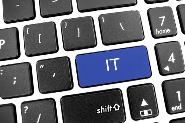 Plano negro moderno Teclado de un portátil con botón azul: it
 - Foto, Imagen