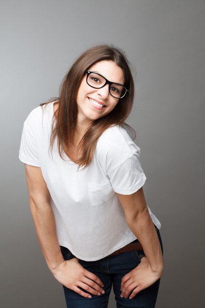 Attractive young woman geek smiling - Foto, afbeelding