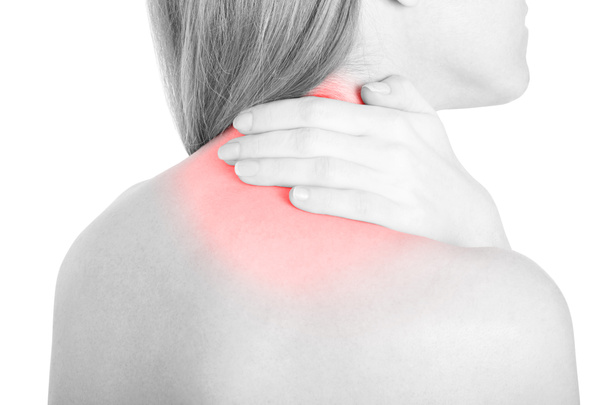 Young woman with neck pain, red area isolated on white, clipping path - Photo, Image