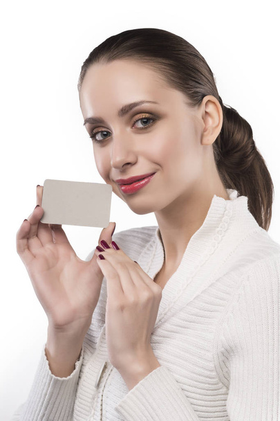 girl holds clear card isolated on white - Fotografie, Obrázek