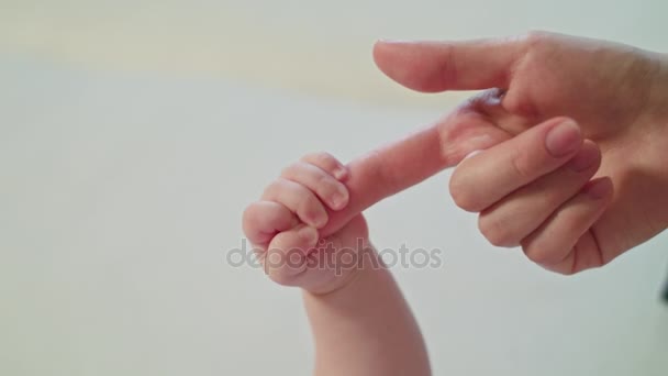 Mothers Finger is Holding Babys Fist - Footage, Video