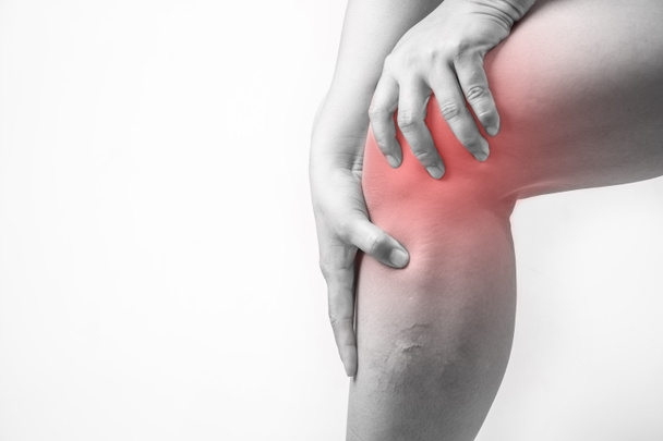 knee injury in humans .knee pain,joint pains people medical, mono tone highlight at knee - Photo, Image