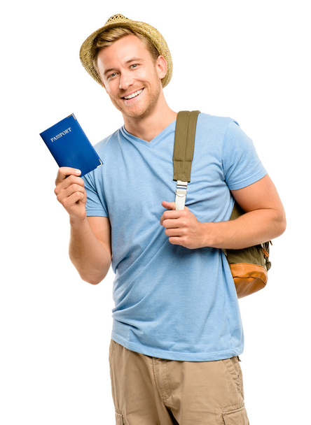 Happy young tourist man holding passport white background - Foto, afbeelding