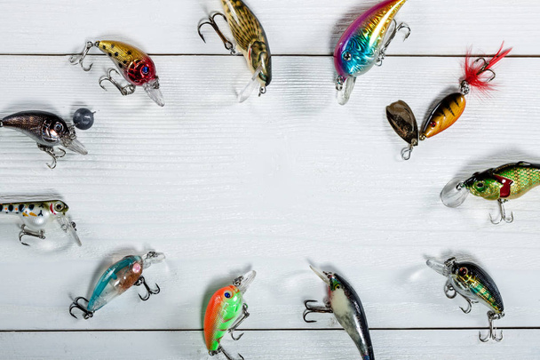 Fishing accessories on a wooden background. - Foto, imagen