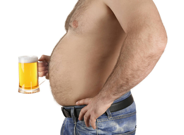 Man with big belly holding glass of beer - Zdjęcie, obraz