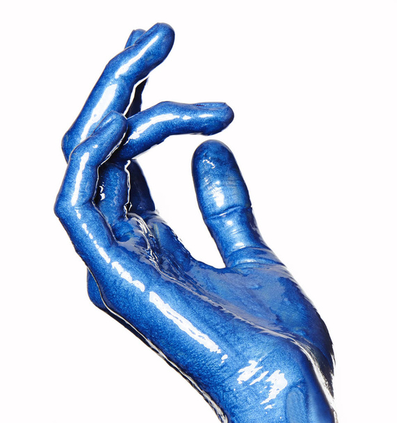 hand with blue paint - Fotografie, Obrázek