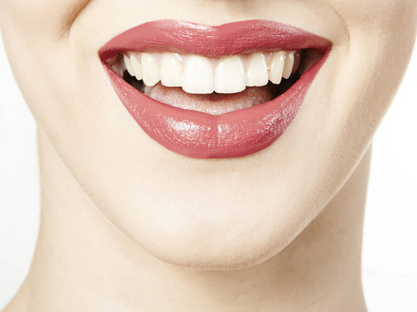 smiling mouth with red lipstick - Fotoğraf, Görsel
