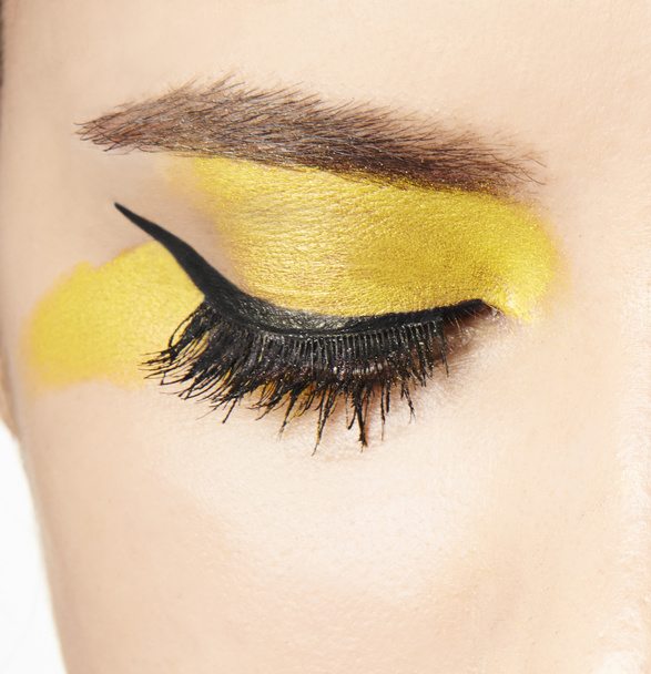 Occhio con ombretto giallo
 - Foto, immagini