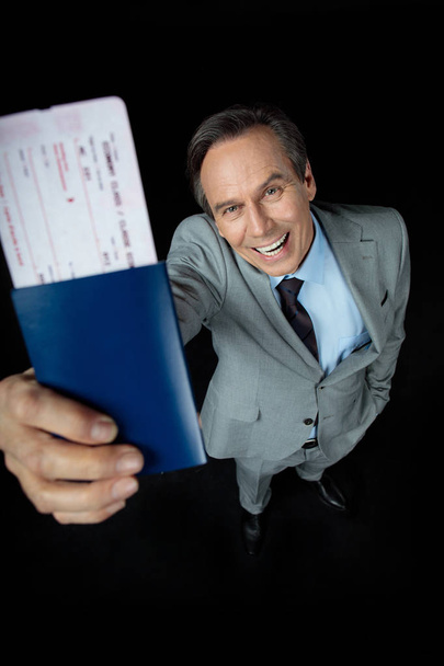 businessman with pasport and air ticket - Photo, Image