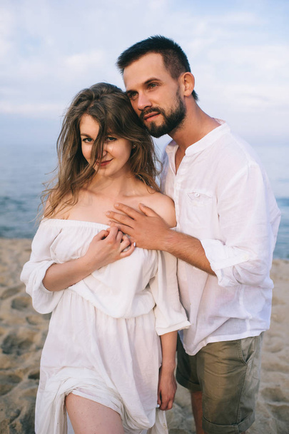 couple in love on the beach - Фото, изображение