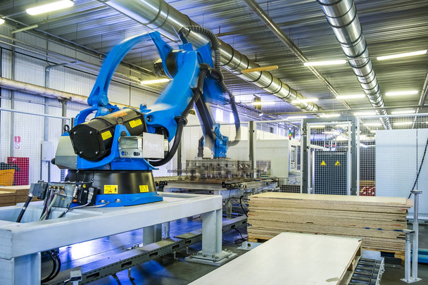 Ładowarka automatyczna robot samodzielne w produkcji - Zdjęcie, obraz