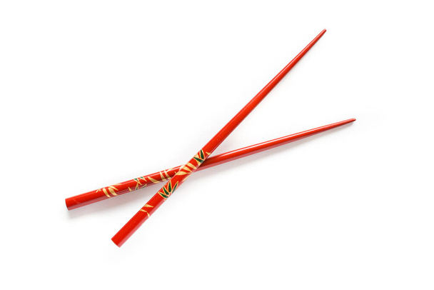 Pair of red chopsticks - Φωτογραφία, εικόνα