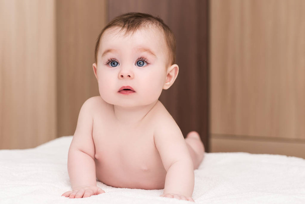 portrait of adorable baby girl with blue eyes - Foto, Imagen