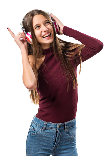 Young teenager girl listening music - Photo, Image