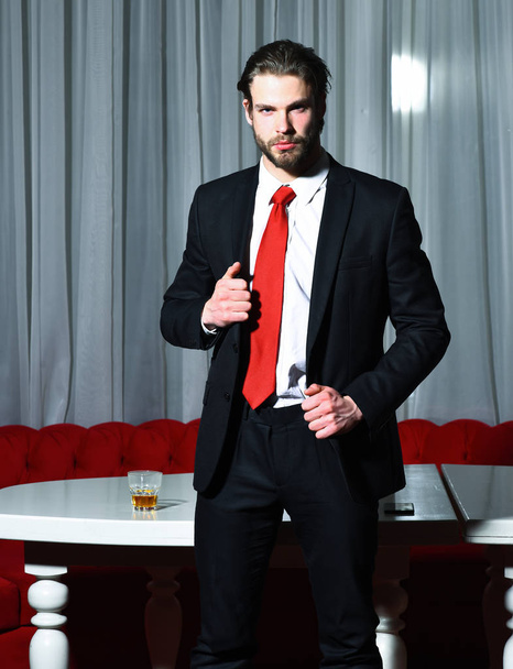 bearded man, businessman with glass of whiskey, cell phone - Zdjęcie, obraz