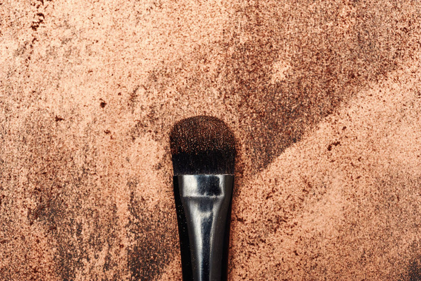 Black beauty Brush on glowing golden Texture - Fotoğraf, Görsel