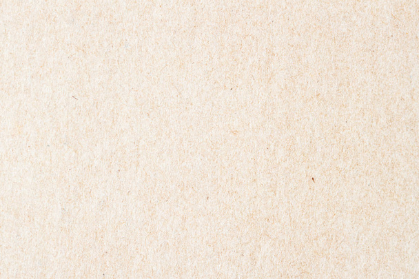 Texture of old organic light cream paper. Recyclable material with small inclusions of cellulose. Background , backdrop, substrate, composition use for design - Photo, Image