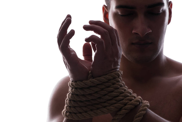 Sexy man with tied hands - Photo, Image