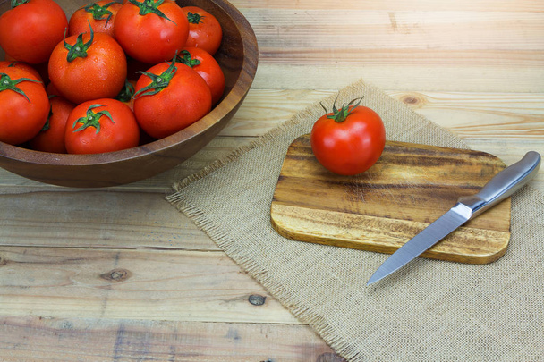 Closeup Fresh ripe tomatoes on wood background - Fotoğraf, Görsel
