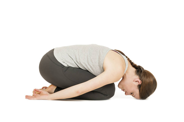 Yoga woman gray _ Garhasana _ side
 - Фото, изображение