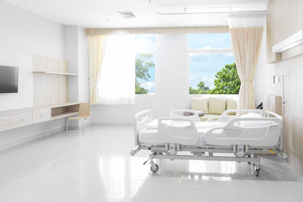 Hospital room with beds and comfortable medical equipped with natural background - Фото, зображення