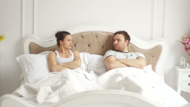 Young couple quarrels in bed. - Imágenes, Vídeo