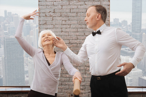 Artistic funny pensioners performing in the dance studio - Fotografie, Obrázek