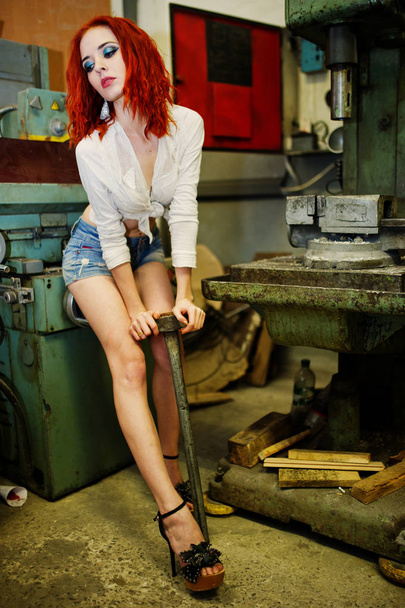 Red haired girl wear on short denim shorts and white blouse with - Foto, immagini