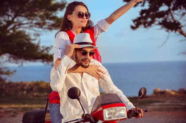 Couple in love riding motorbike - Photo, Image