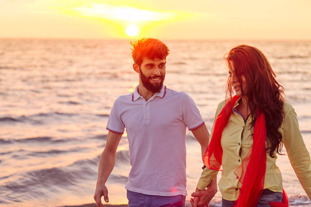 Romantic couple on beautiful beach - Фото, изображение