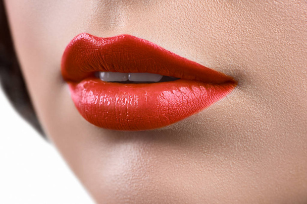 Close up shot of the lips of a woman wearing lipstick or lip glo - Foto, Imagen