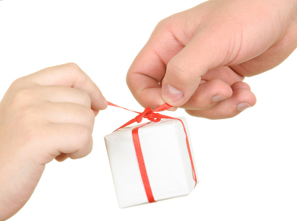 Two hands hold box with gift - Foto, Imagem