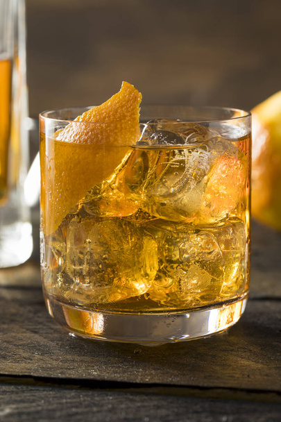Boozy Homemade Old Fashioned Bourbon on the Rocks - Valokuva, kuva
