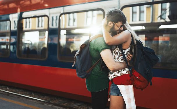 couple reunion at train station - Foto, immagini
