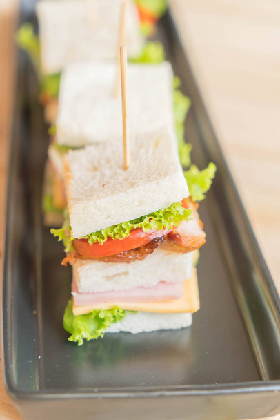sandwich on wood background - Foto, afbeelding