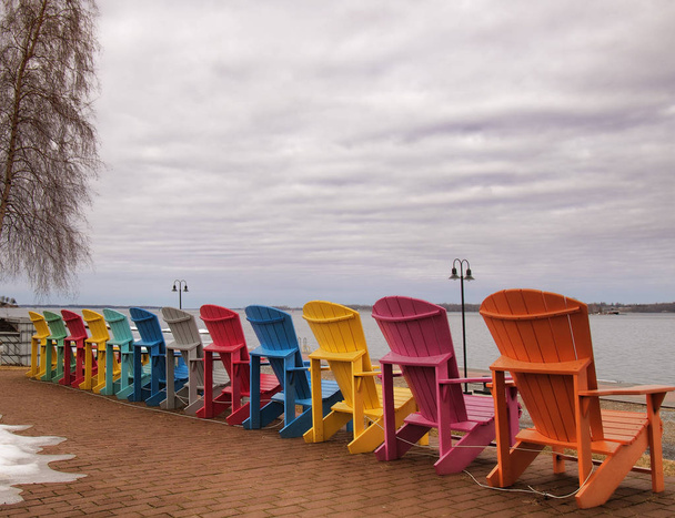 Adirondack chairs on the shore of The Saint Lawrence River  - Photo, Image