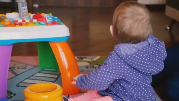 Adorable baby plays with mother and grandmother in the room - Footage, Video