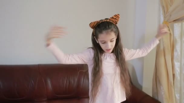 little cute girl dancing and fooling around at home - Video, Çekim