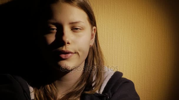 Sad teen girl thinking of something. 4K UHD. - Footage, Video