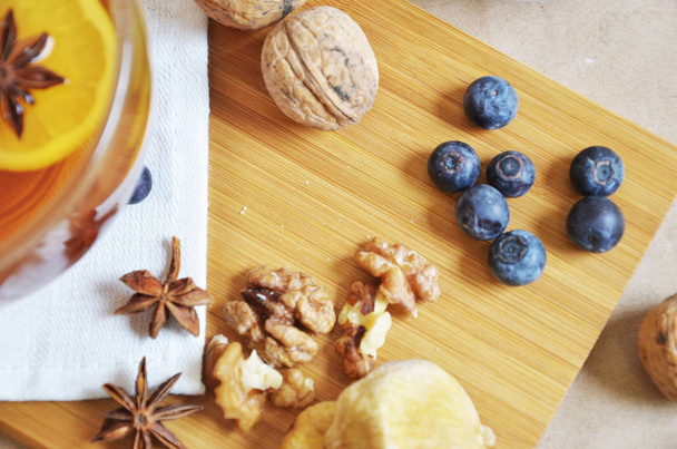 tea with nuts, dried fruits and jam - 写真・画像