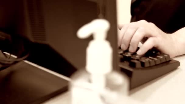 Man uses a computer keyboard at the lab - Felvétel, videó