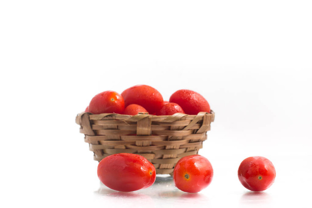 Cherry Tomatoes into a basket - Fotoğraf, Görsel