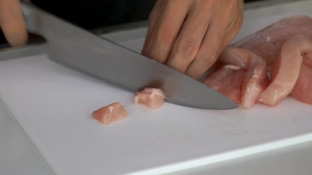  Chopping chicken before cooking - Footage, Video