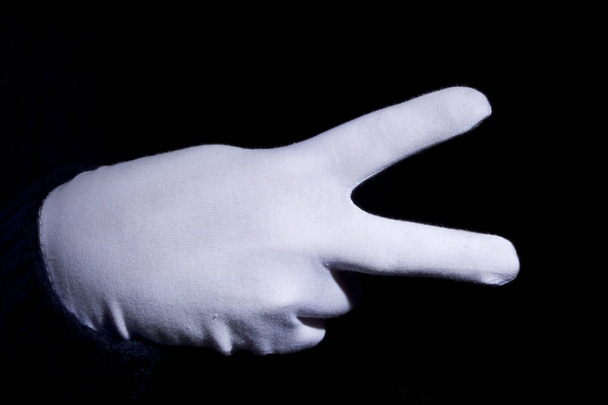 Hand in a white glove - Φωτογραφία, εικόνα