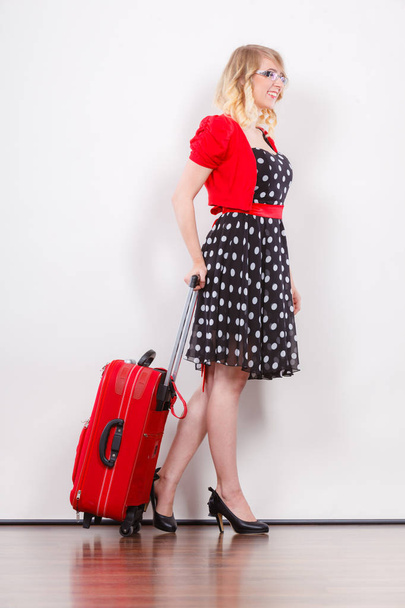 Elegant fashion woman with red suitcase - Zdjęcie, obraz
