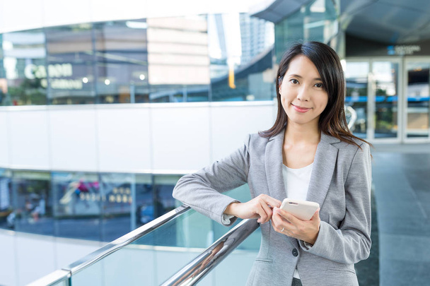 Asian businesswoman using cellphone  - Zdjęcie, obraz